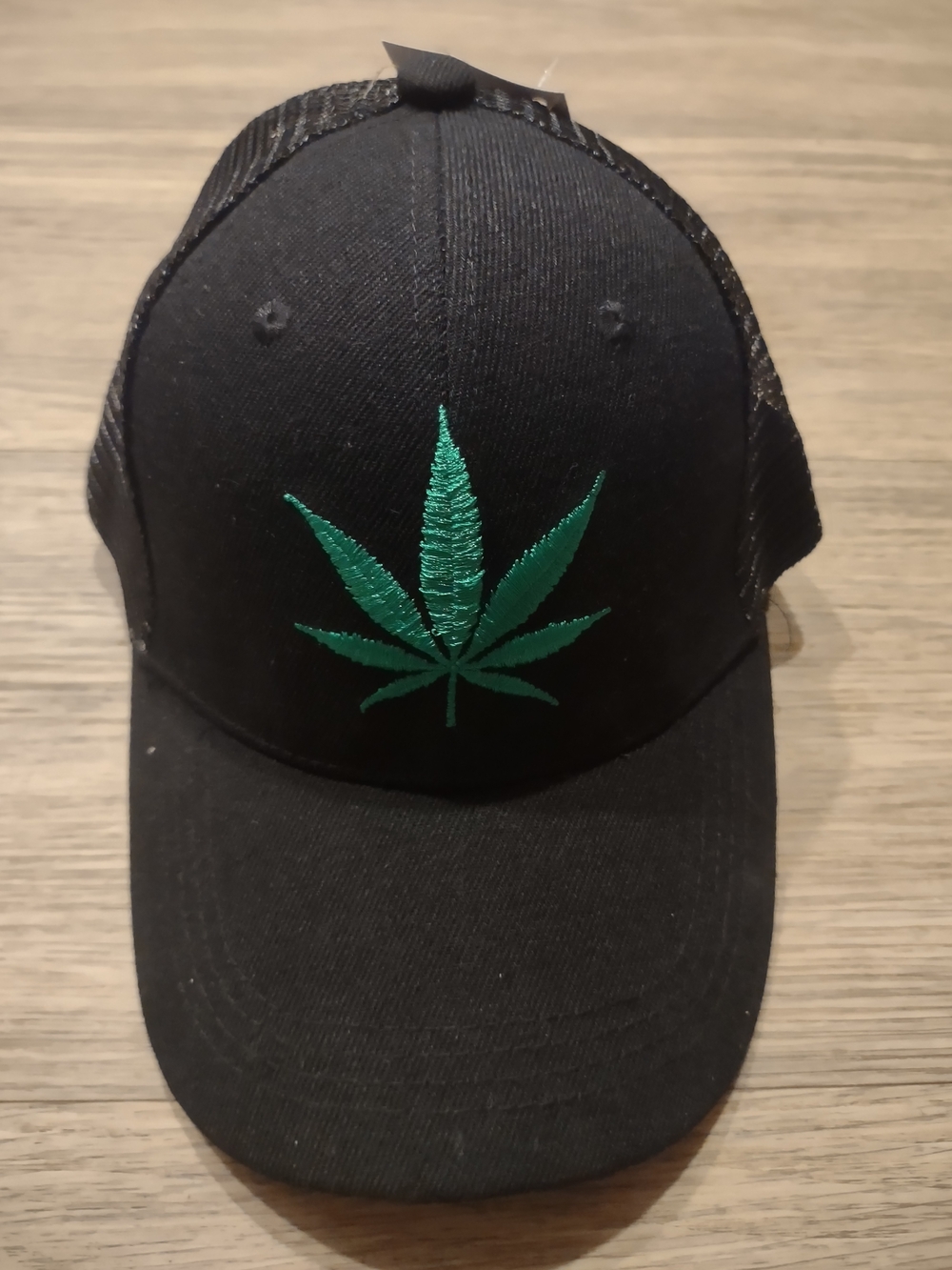 Black Trucker Hat with Green Leaf Embroidery